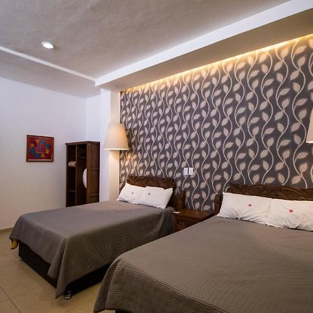 צ'ולולה Hotel Santa Rosa By Rotamundos מראה חיצוני תמונה