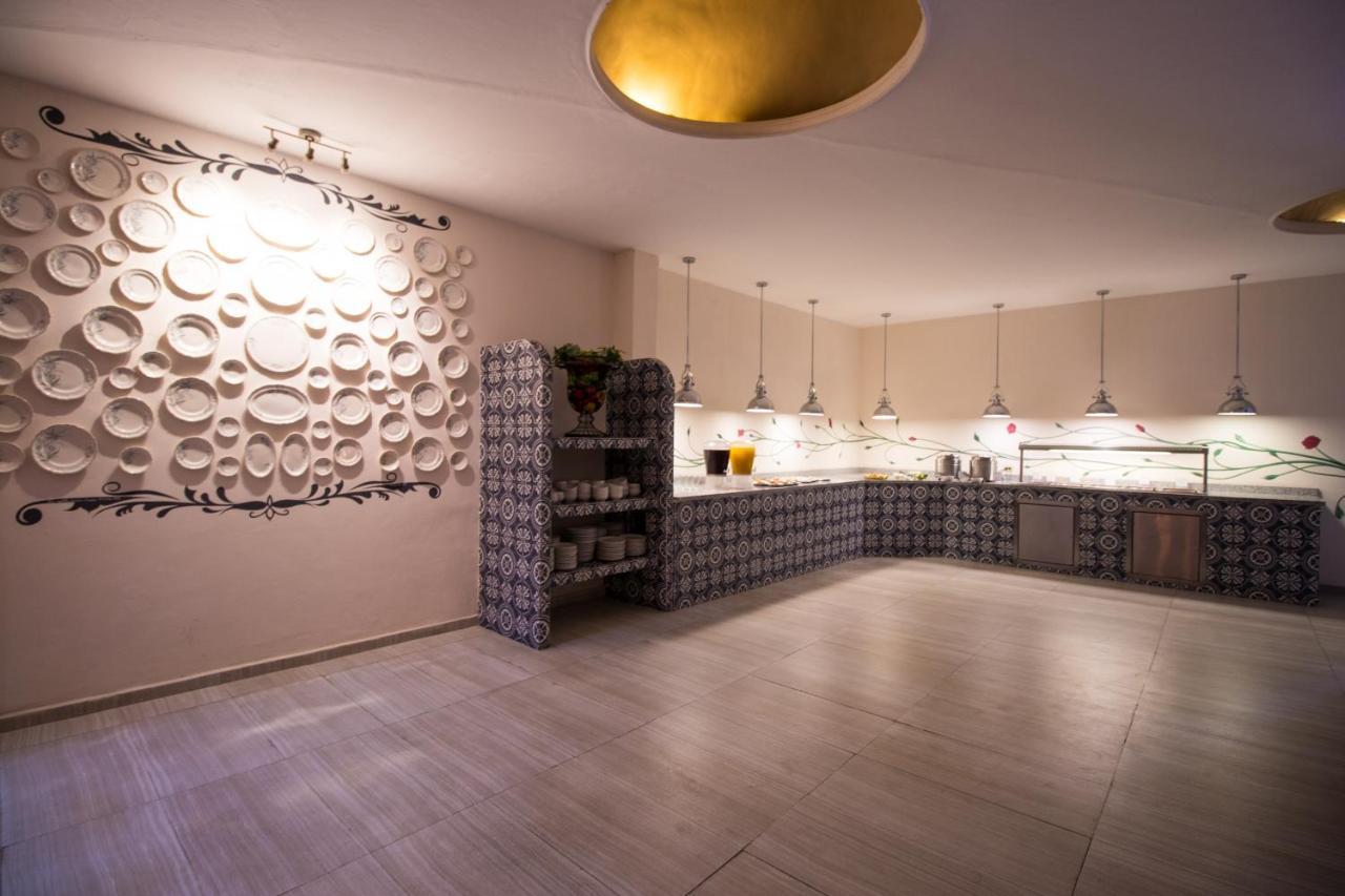 צ'ולולה Hotel Santa Rosa By Rotamundos מראה חיצוני תמונה